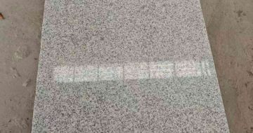 深圳芝麻白光面毛板