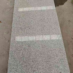 深圳芝麻白光面毛板